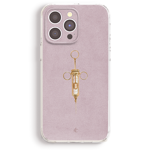 a pink iphone case with a gold syringe on it