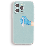 a hand holding a syquet in a blue case
