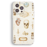 a phone case with a picture of a human heart and other items