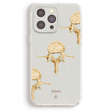 a cell phone case with gold flowers on it