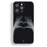 a phone case with a skeleton hand holding a heart