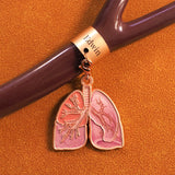 Personalized lung anatomy stethoscope charm attached to stethoscope tubing