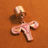Angled close-up of a uterus anatomy stethoscope charm