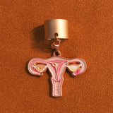 Front view of a pink uterus anatomy stethoscope charm